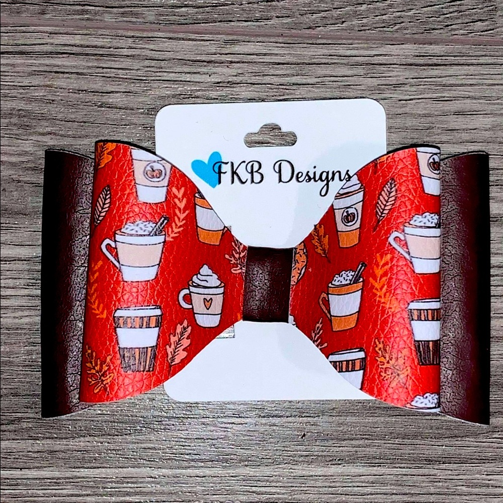 Faux leather 4 inch bow with alligator clip